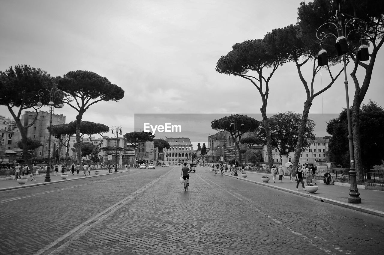 Architecture Black And White Black And White Photography Blackandwhite Building Exterior Built Structure Bycicle City Colosseo Roma Colosseum Day Direction Footpath Real People Sky Street The Way Forward Tree It's About The Journey