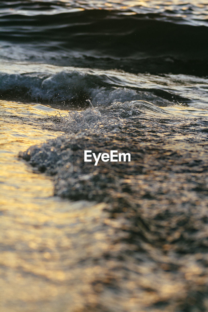 Close-up of wave on beach