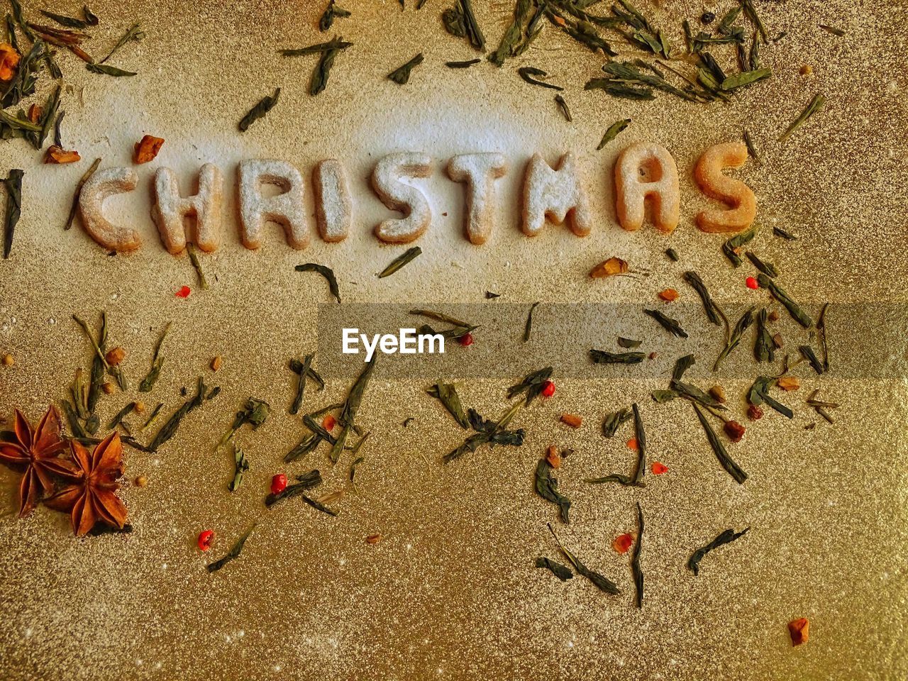 Close-up of christmas text on marble