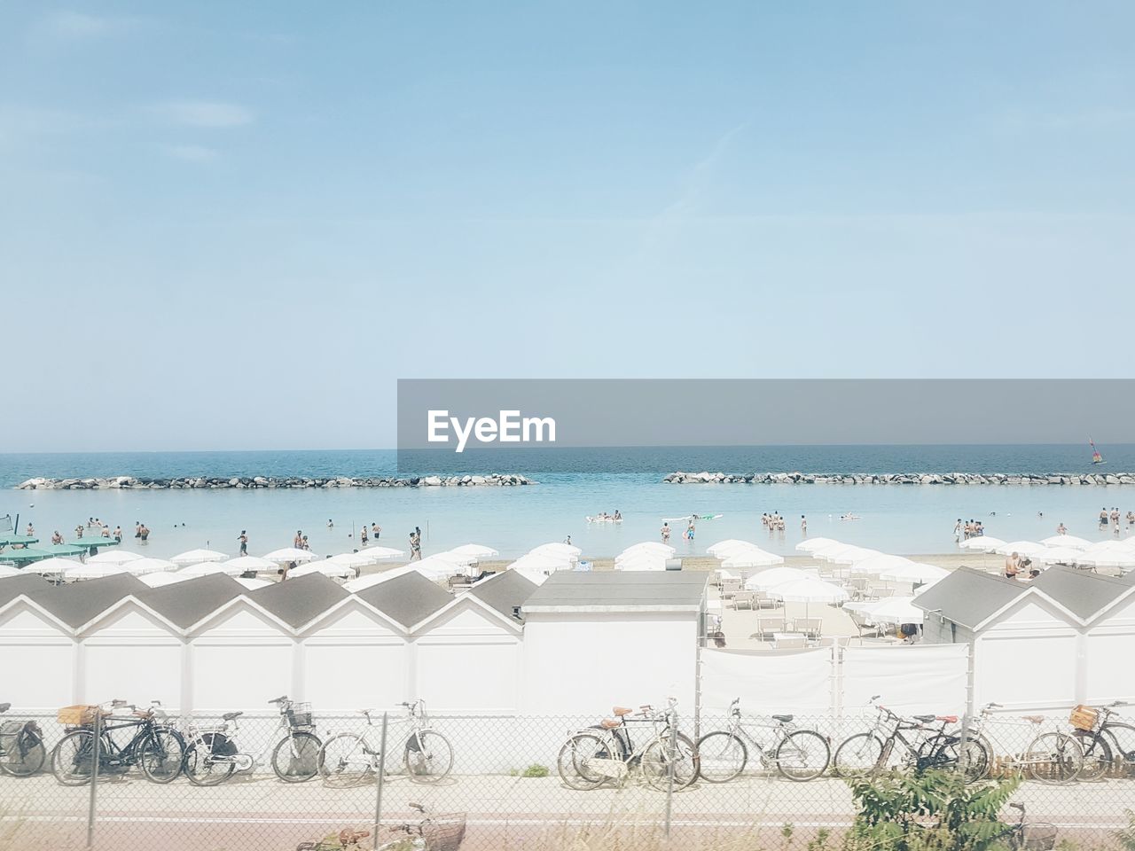 CHAIRS ON BEACH AGAINST SEA