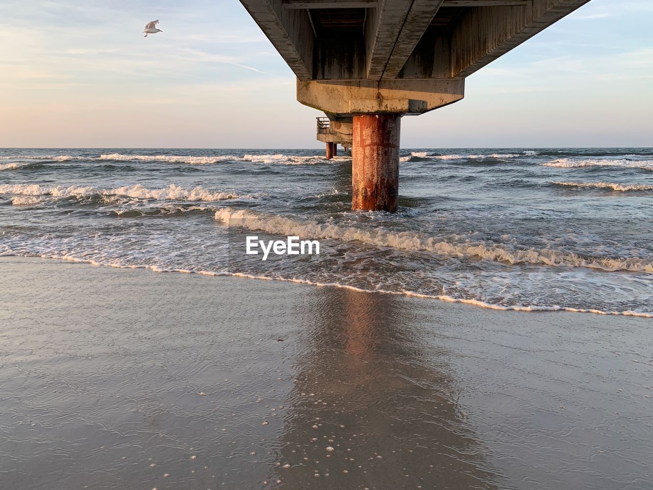 Scenic view of sea against sky at sunset