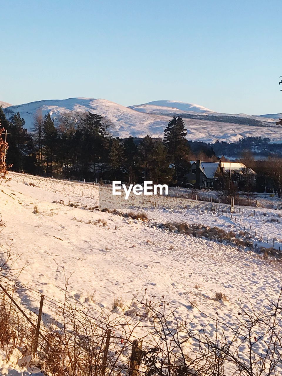 SCENIC VIEW OF MOUNTAINS AGAINST CLEAR SKY