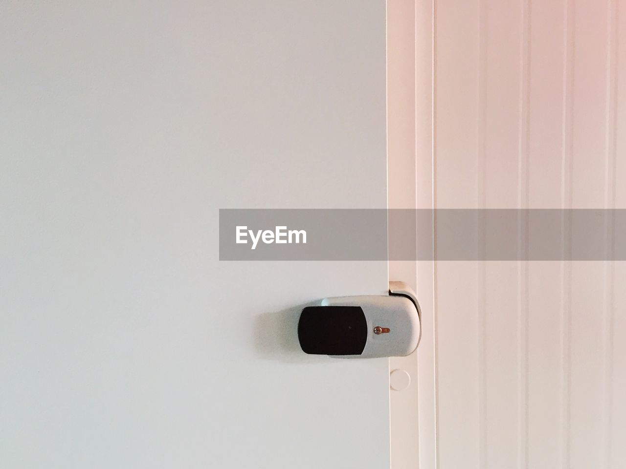 Close-up of futuristic lock on door at home