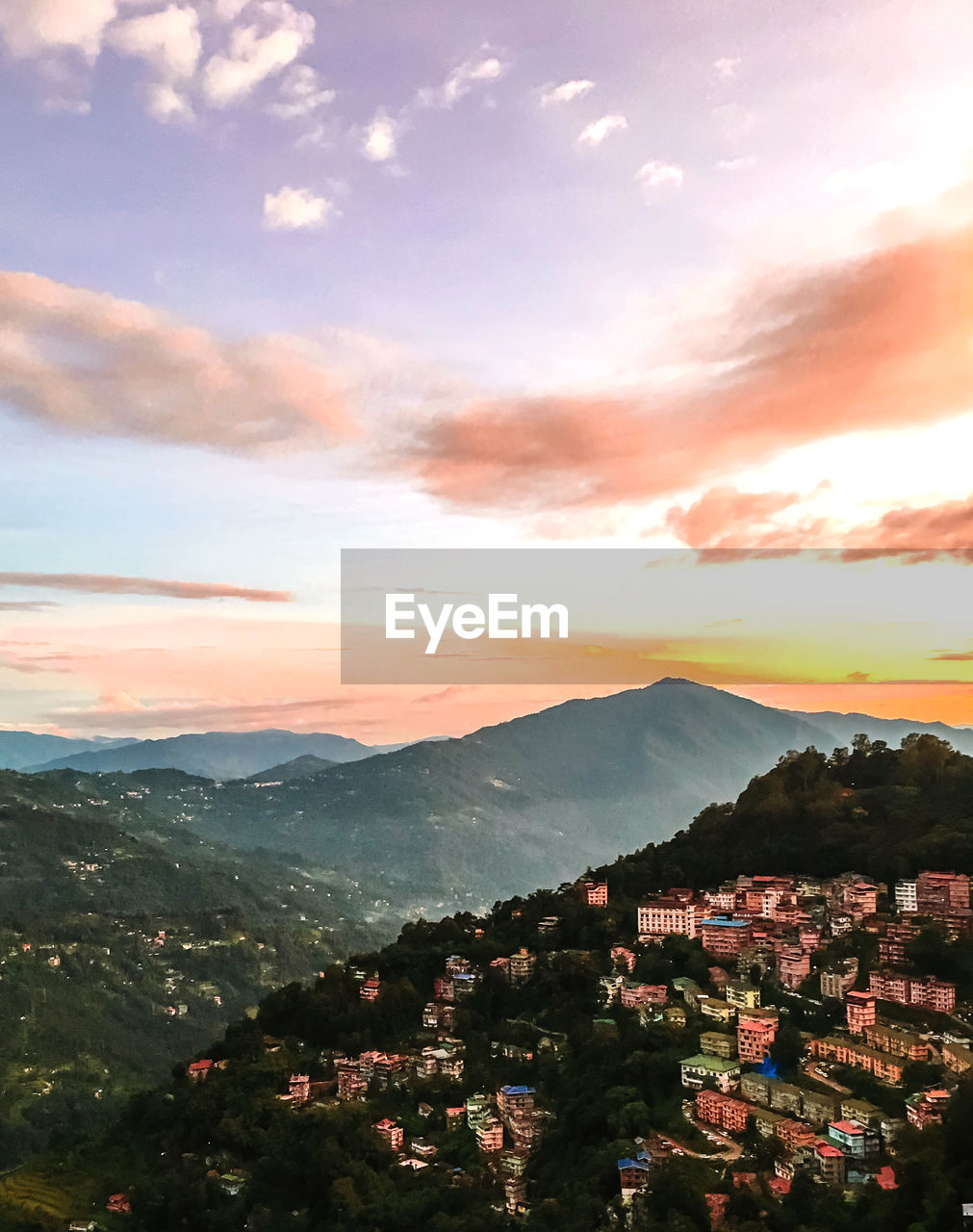 High angle view of townscape against sky during sunset