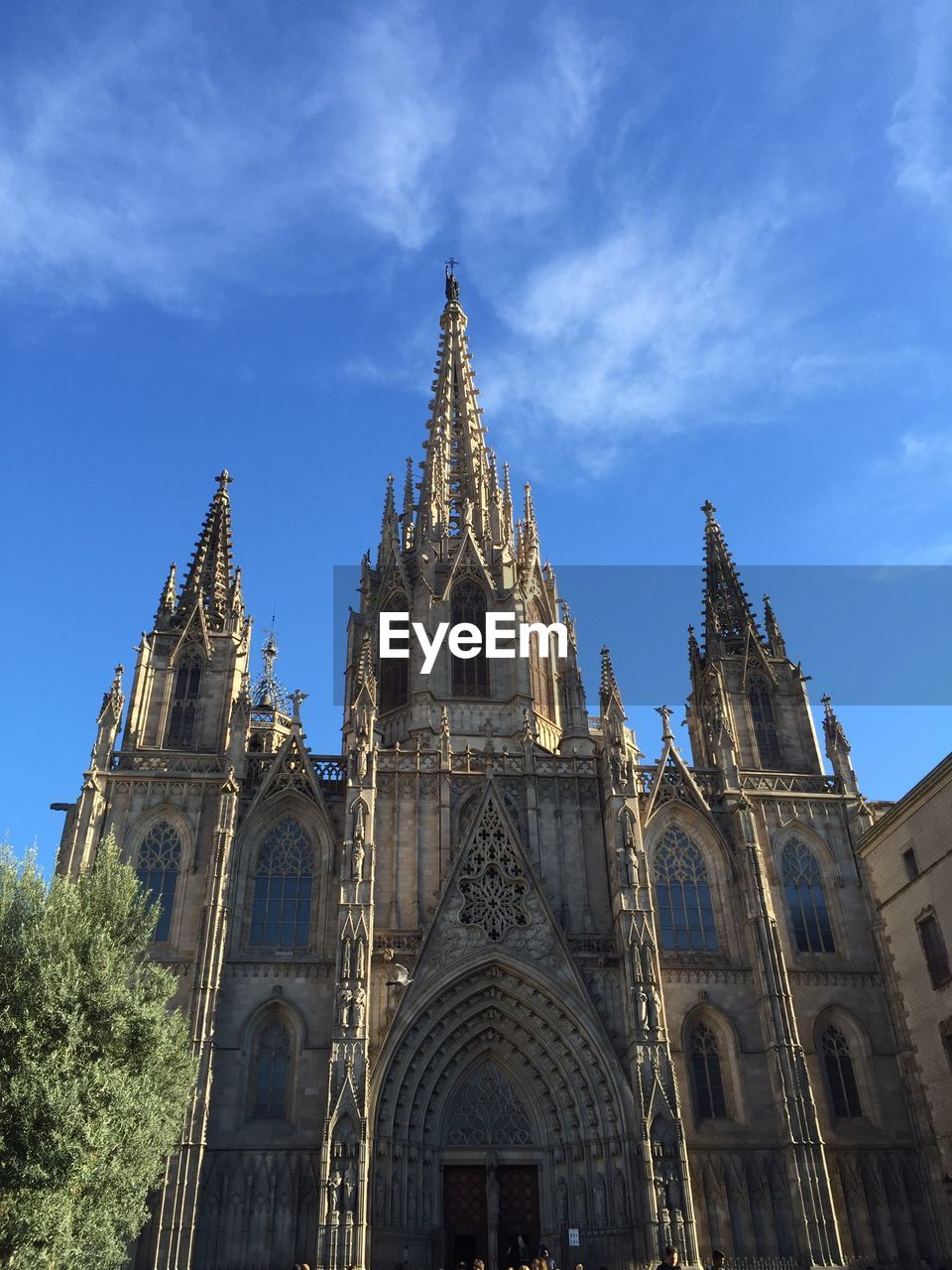 Low angle view of barcelona cathedral against sky