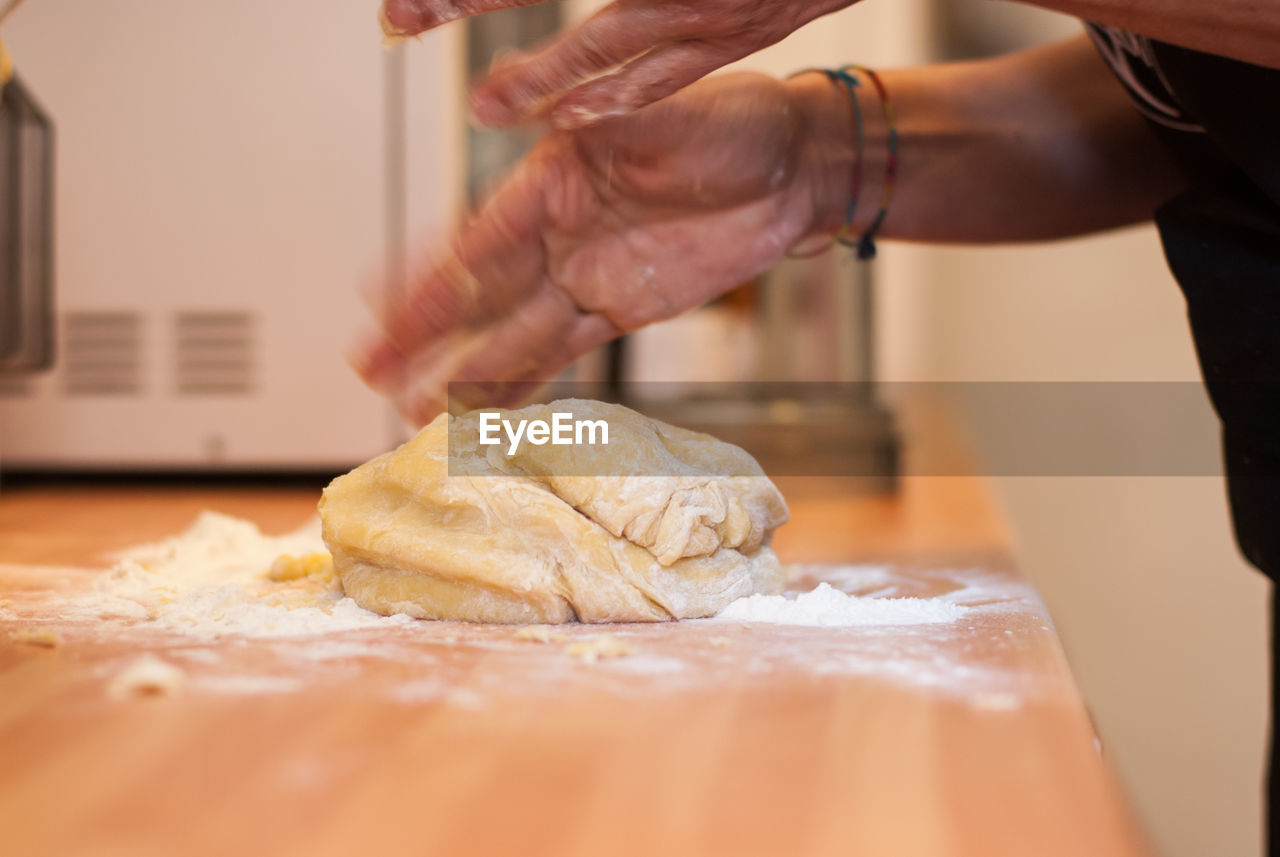 Close-up of man preparing food