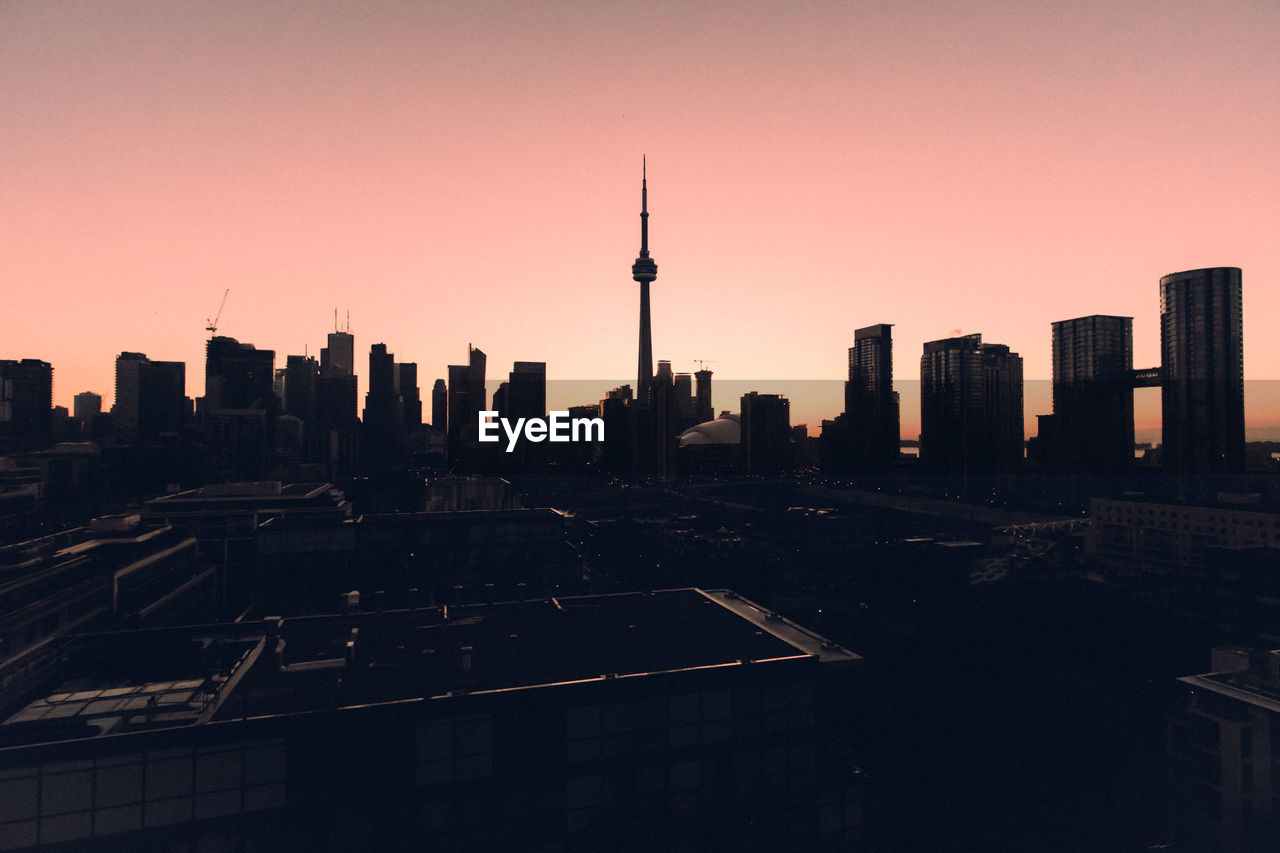 View of cityscape against sky during sunset