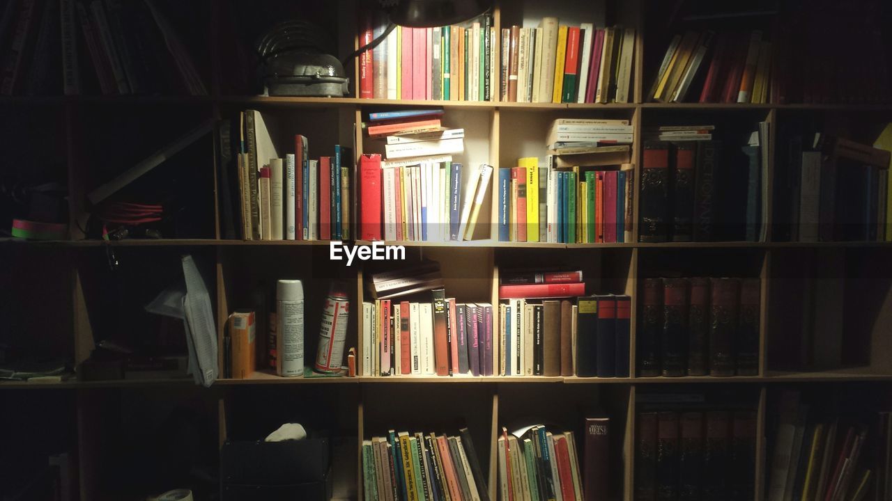 Books shelves at illuminated house