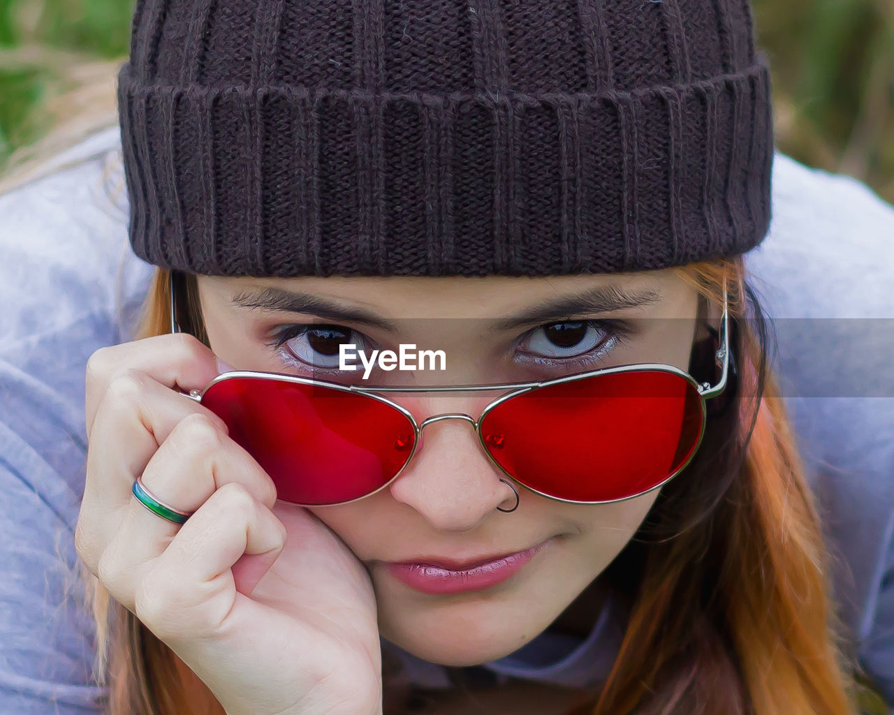 Portrait of young woman wearing sunglasses