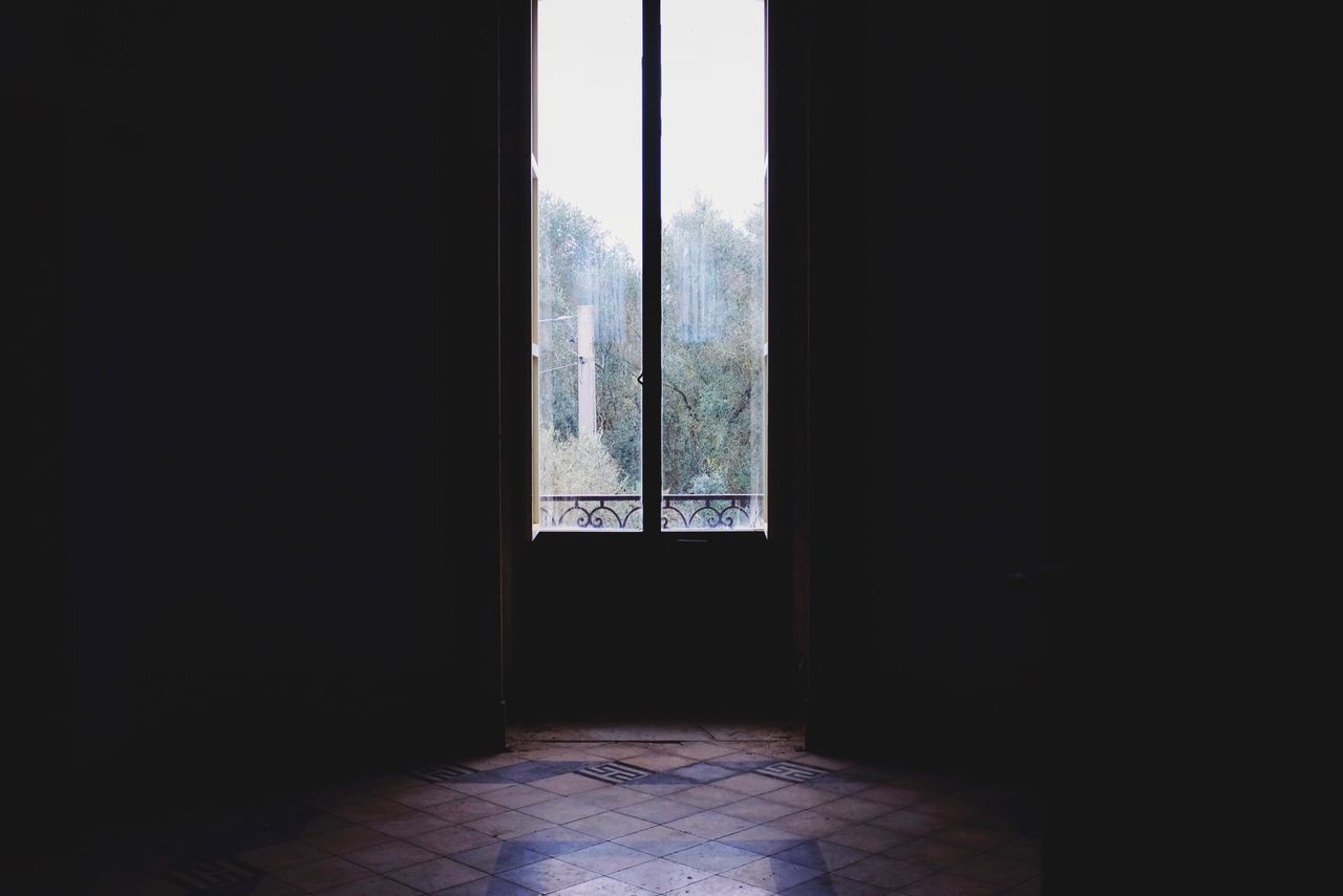 Empty interior with closed glass door