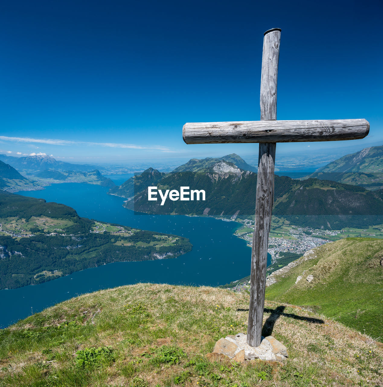 CROSS AGAINST BLUE SKY