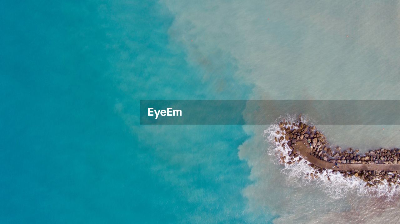 Aerial view of pier in sea