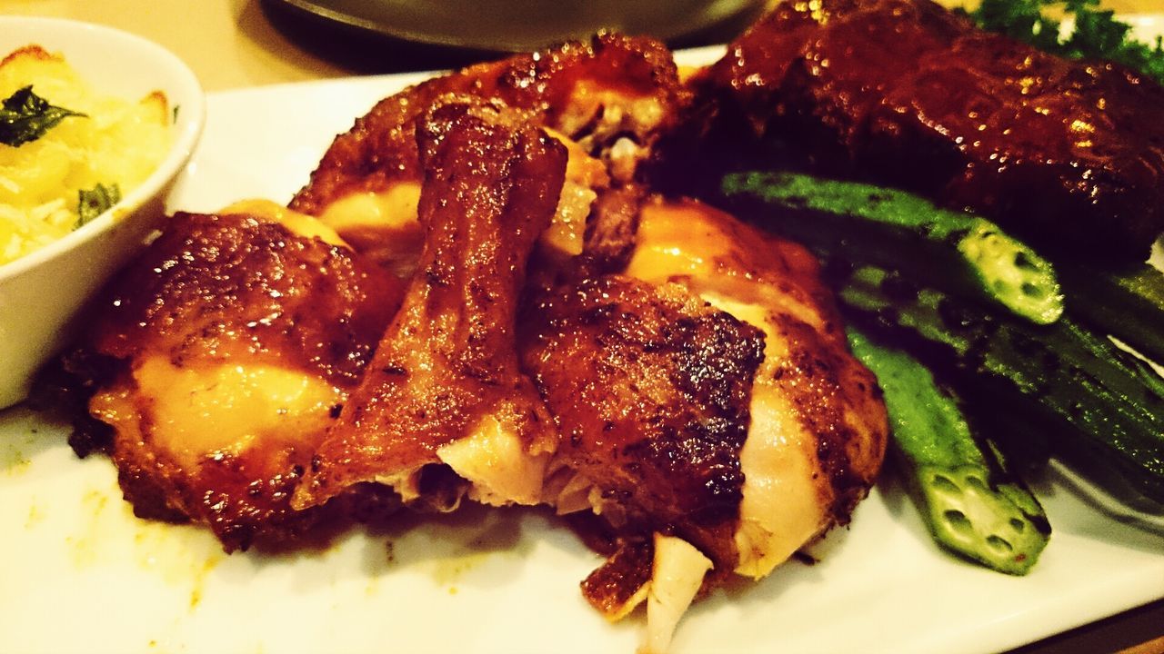 Close-up of barbeque chicken on plate