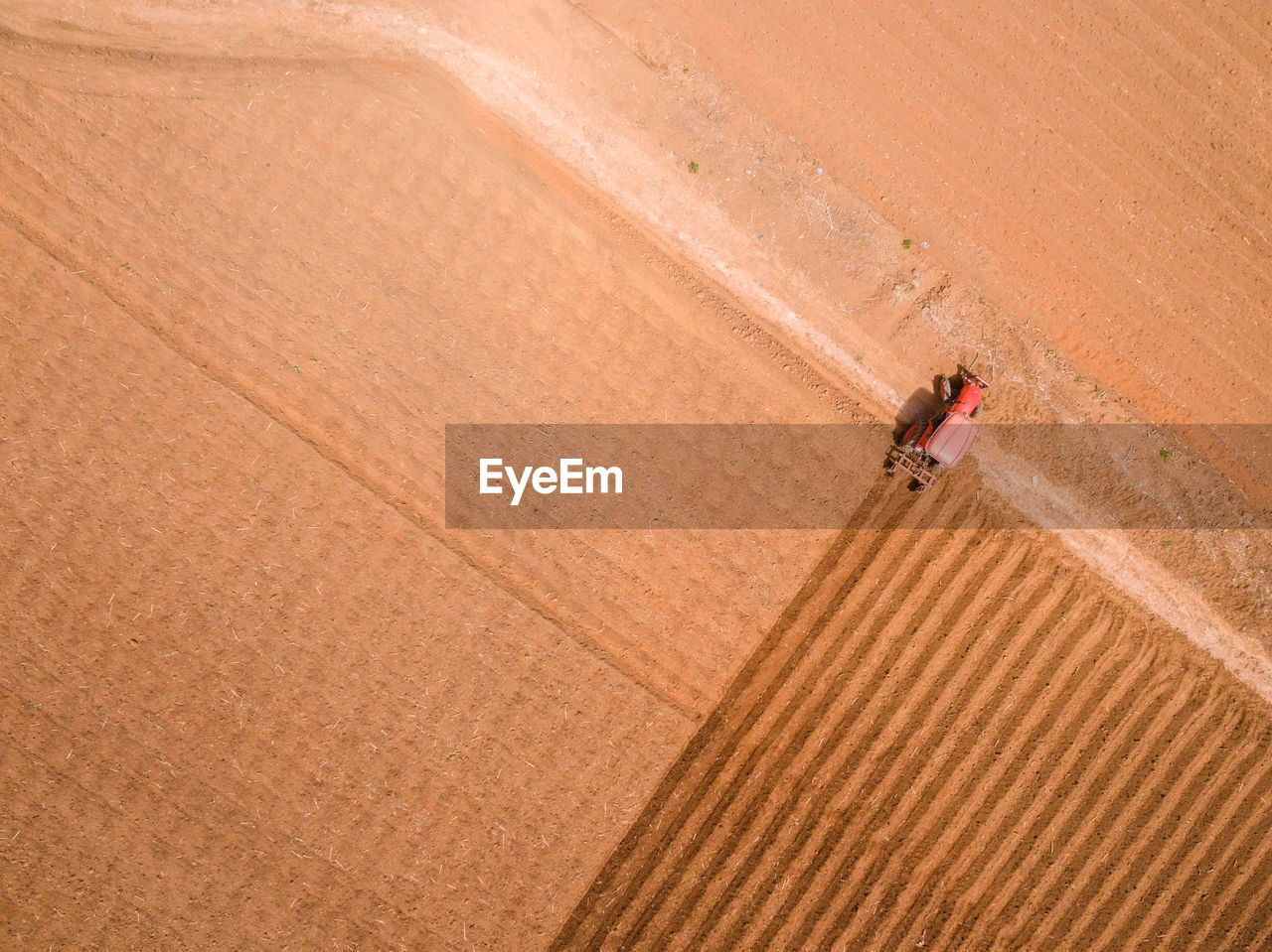 Aerial view of tractor in field