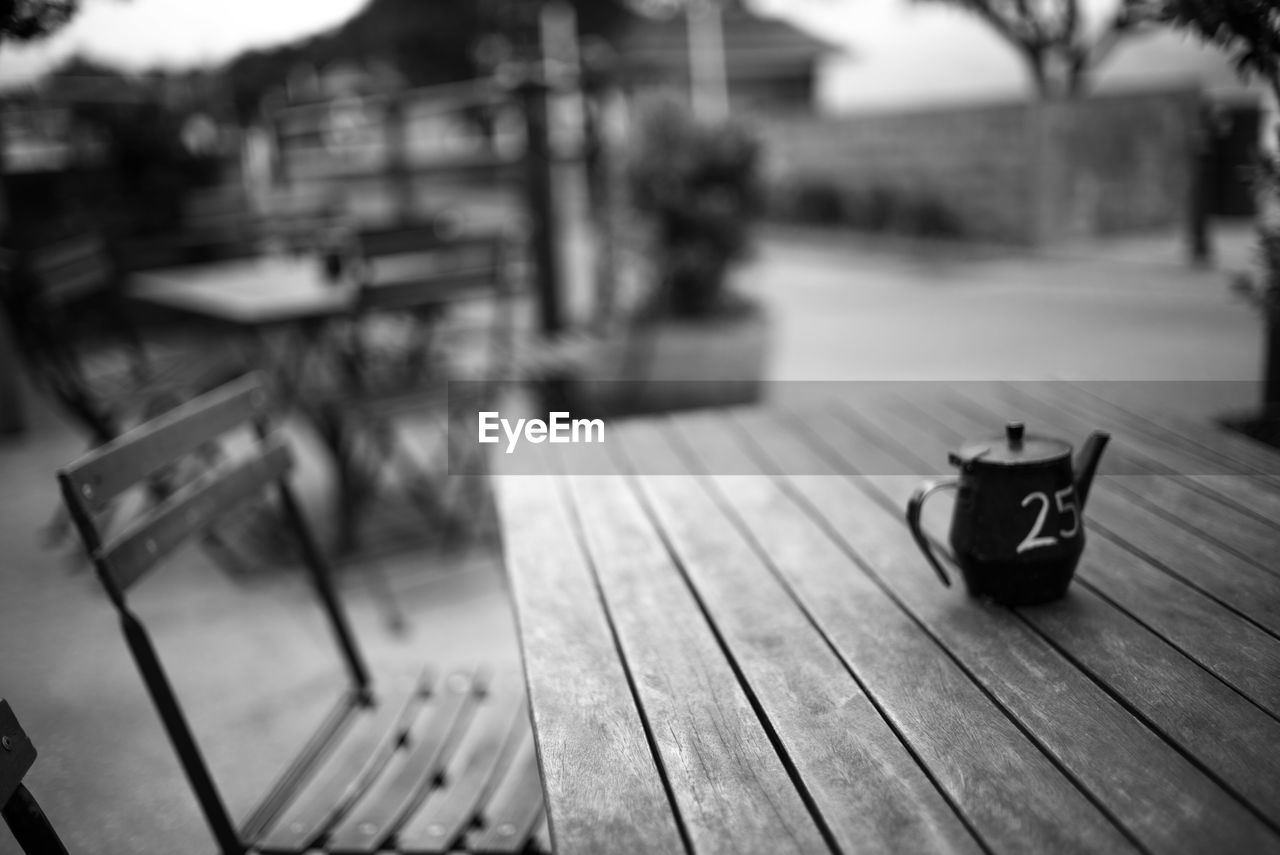 Wooden bench on table