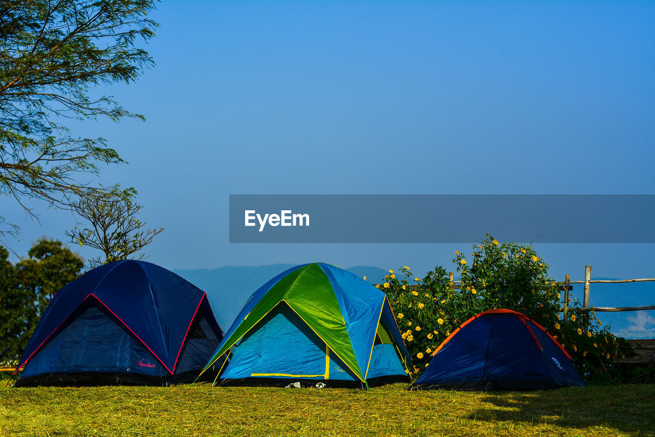 TENT AGAINST CLEAR SKY