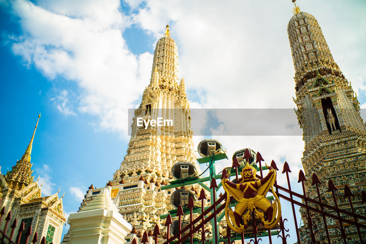 LOW ANGLE VIEW OF TEMPLE BUILDING AGAINST SKY