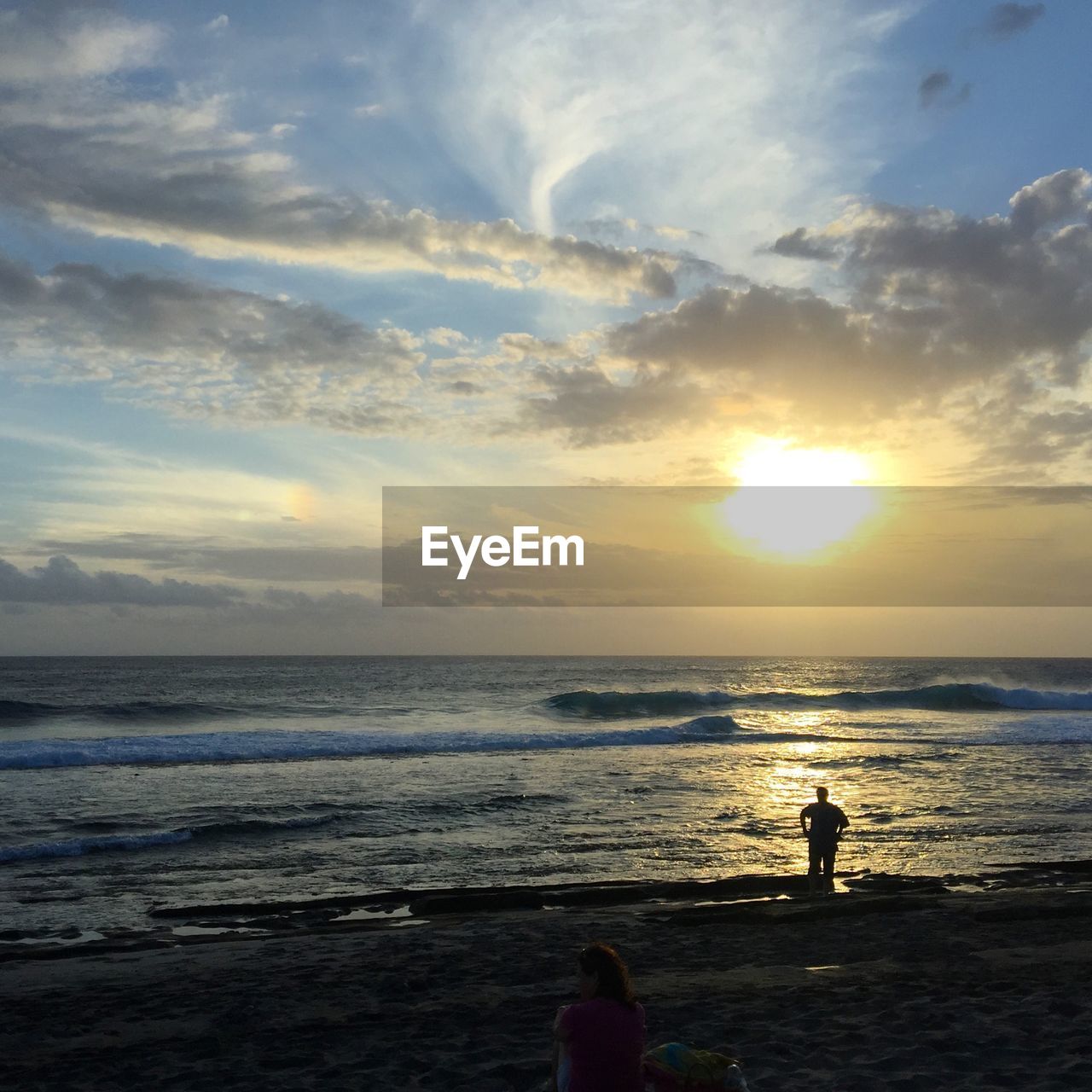 Scenic view of beach and sea against sky during sunset