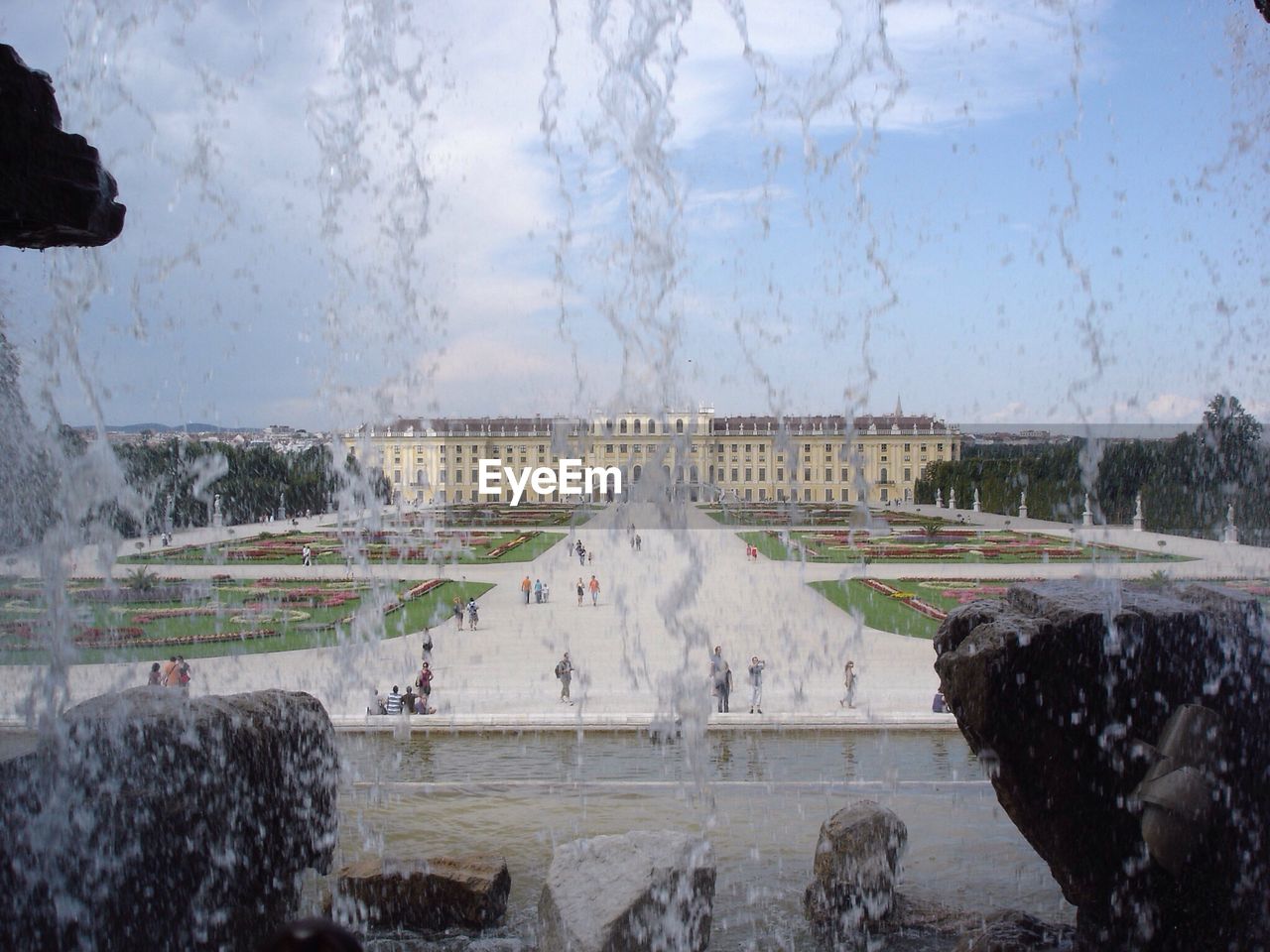 Fountain against building