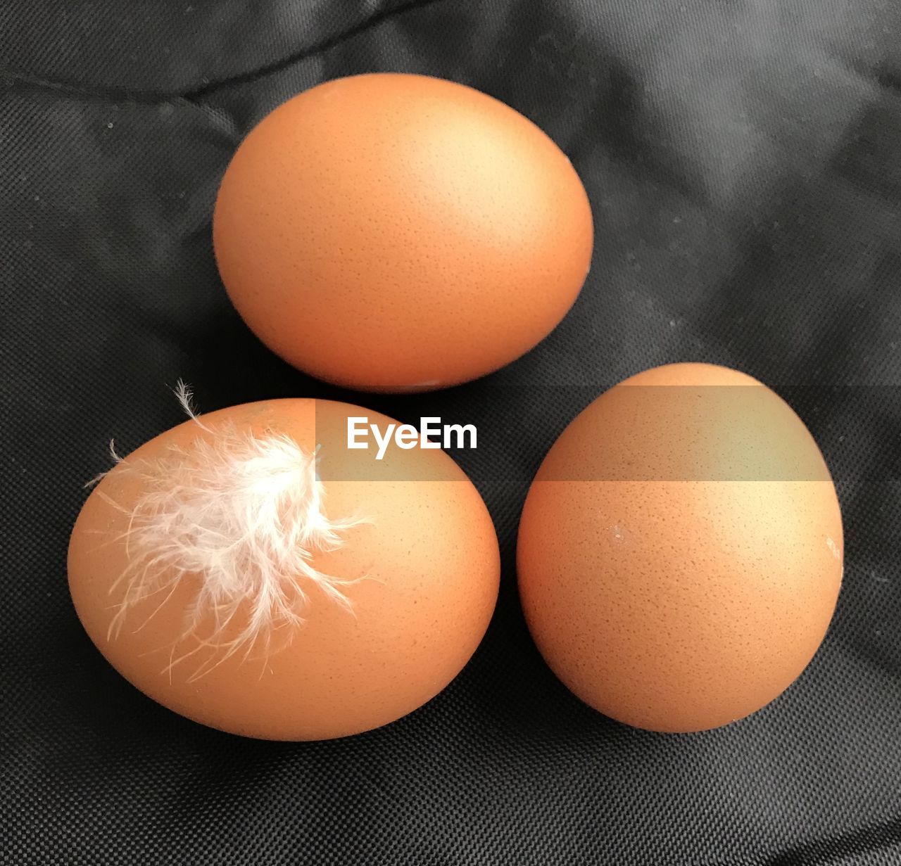 The composition of chicken eggs on the table.
