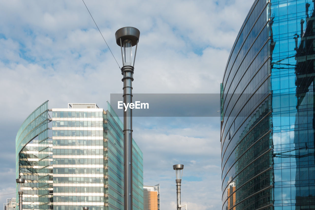 Low angle view of modern buildings against sky