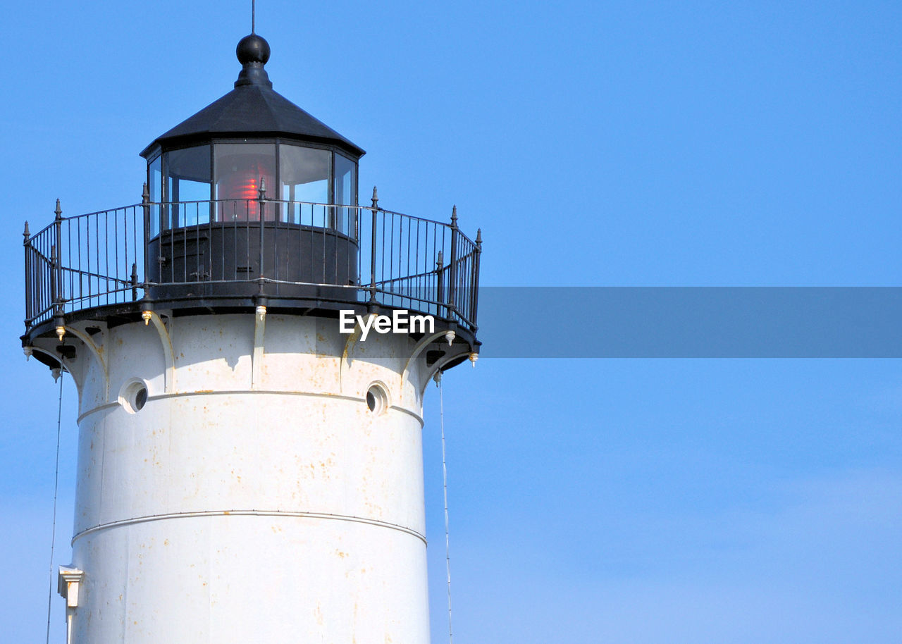 Low angle view of water tower against clear sky