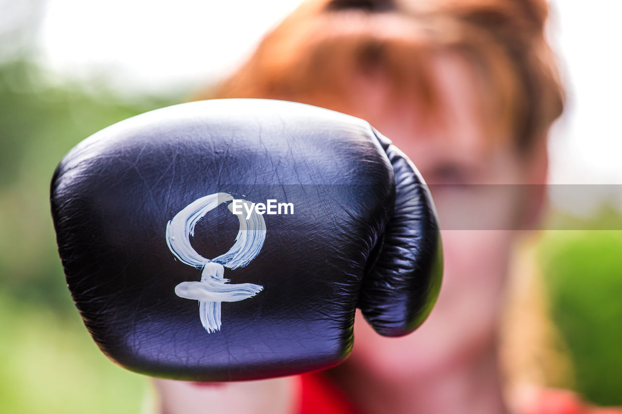 Close-up of sign on boxing glove