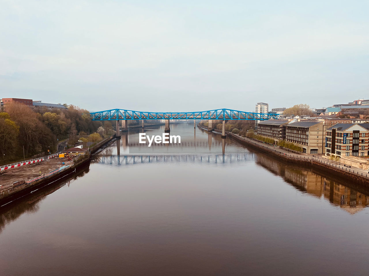 Bridge over river against sky