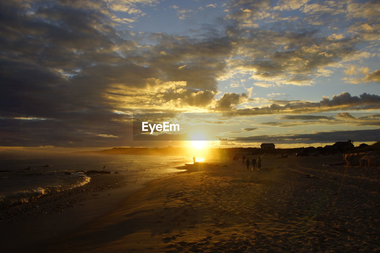 SCENIC VIEW OF SUNSET OVER SEA