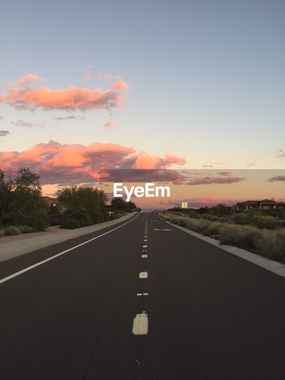 Road against sky during sunset