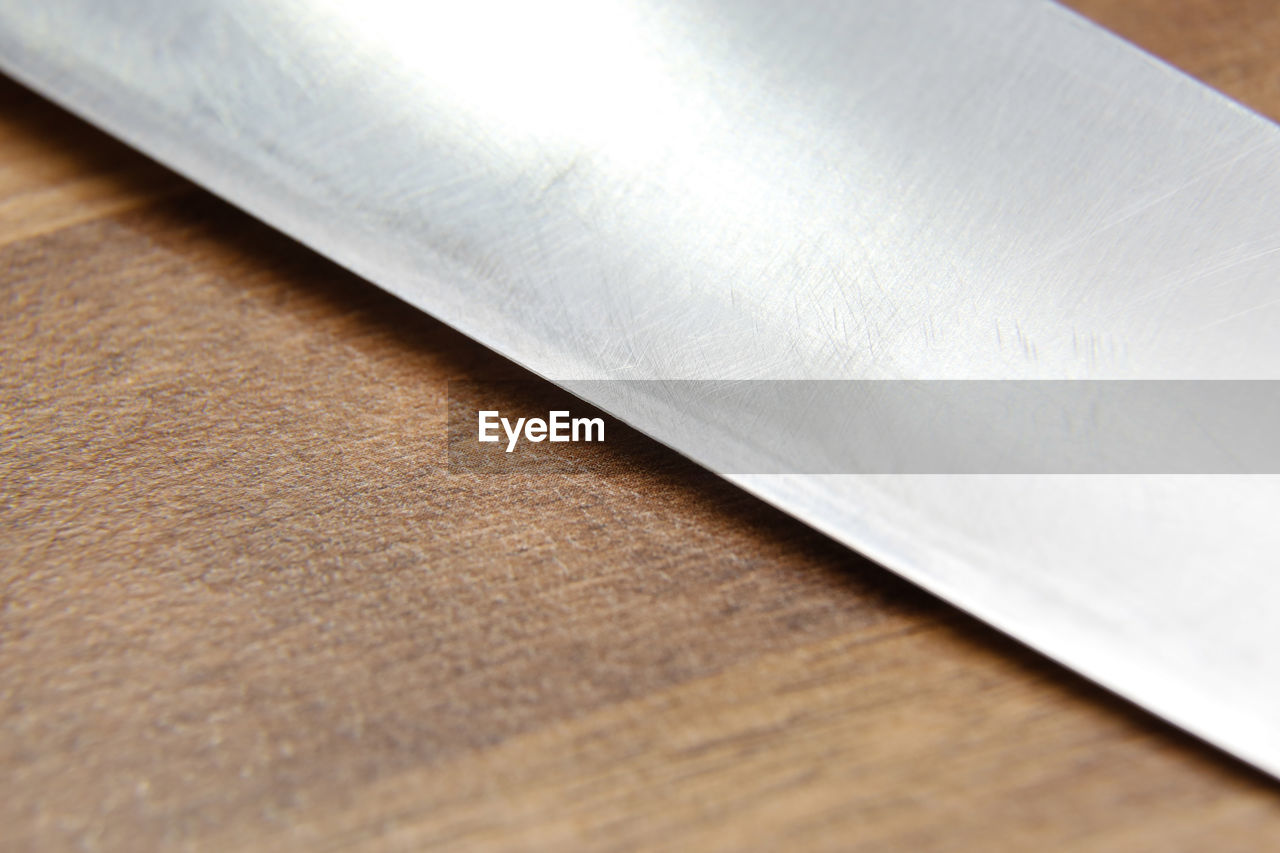 High angle view of kitchen knife on table