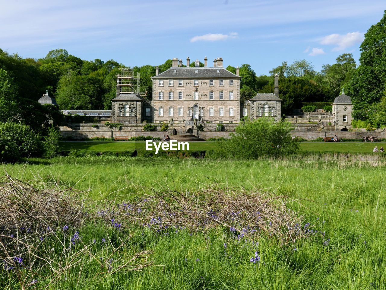 Scenic view of pollok house against sky