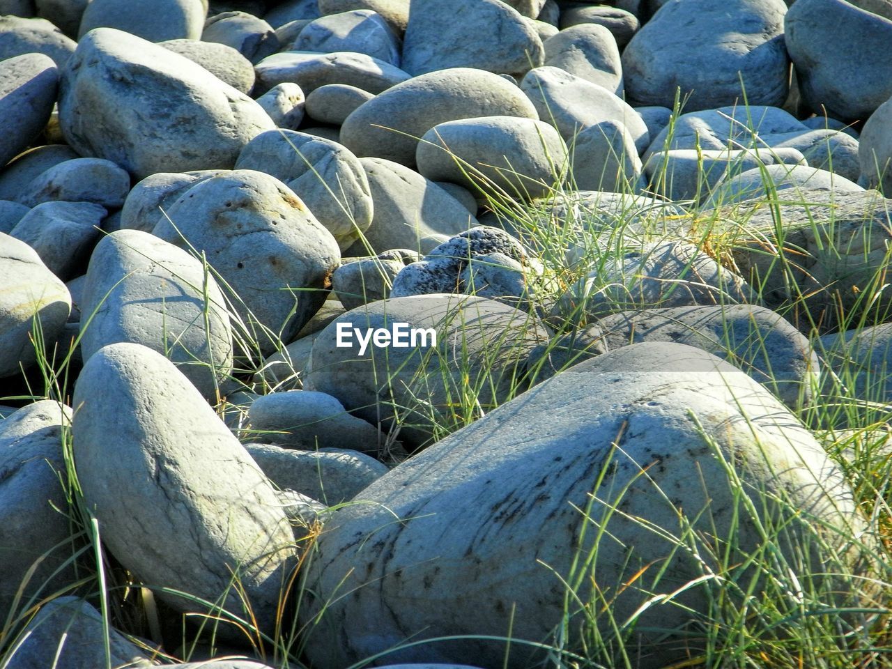 Full frame shot of stones on beach