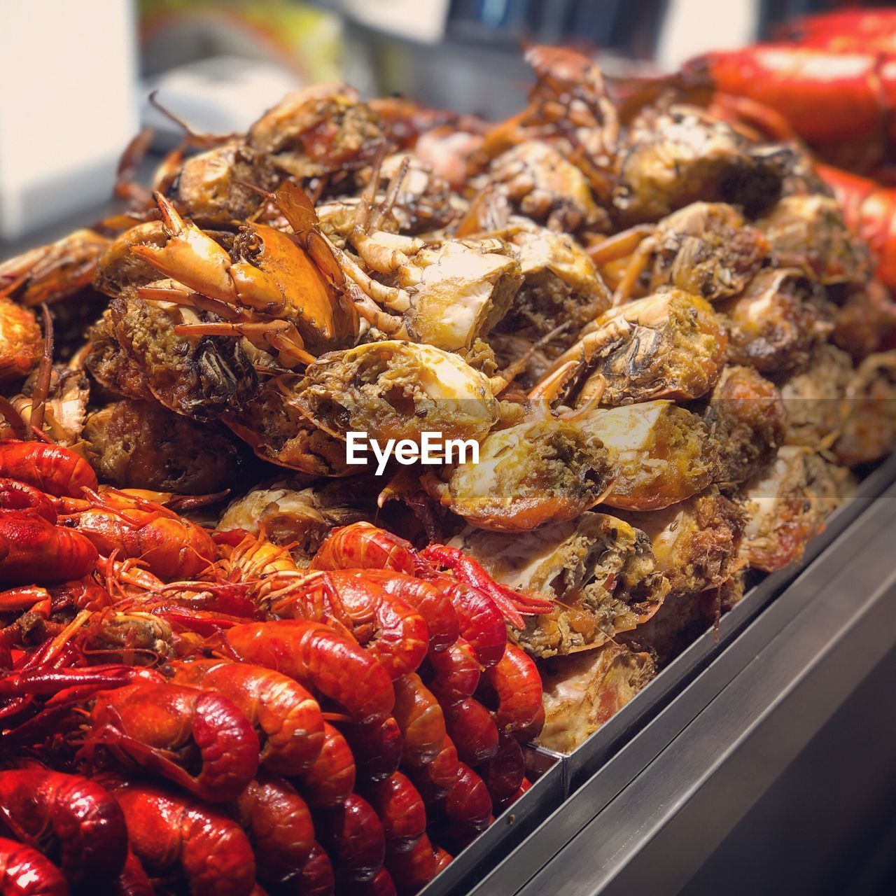 HIGH ANGLE VIEW OF SEAFOOD IN CONTAINER