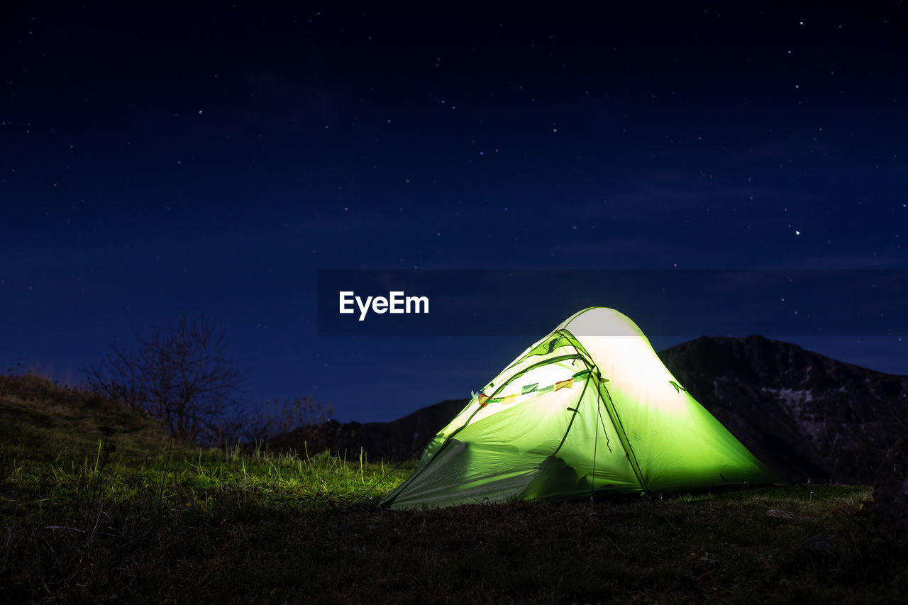 Nightscpe with a tent, balkan mountain, alt. 1520 m, bulgaria,  starry summer night.