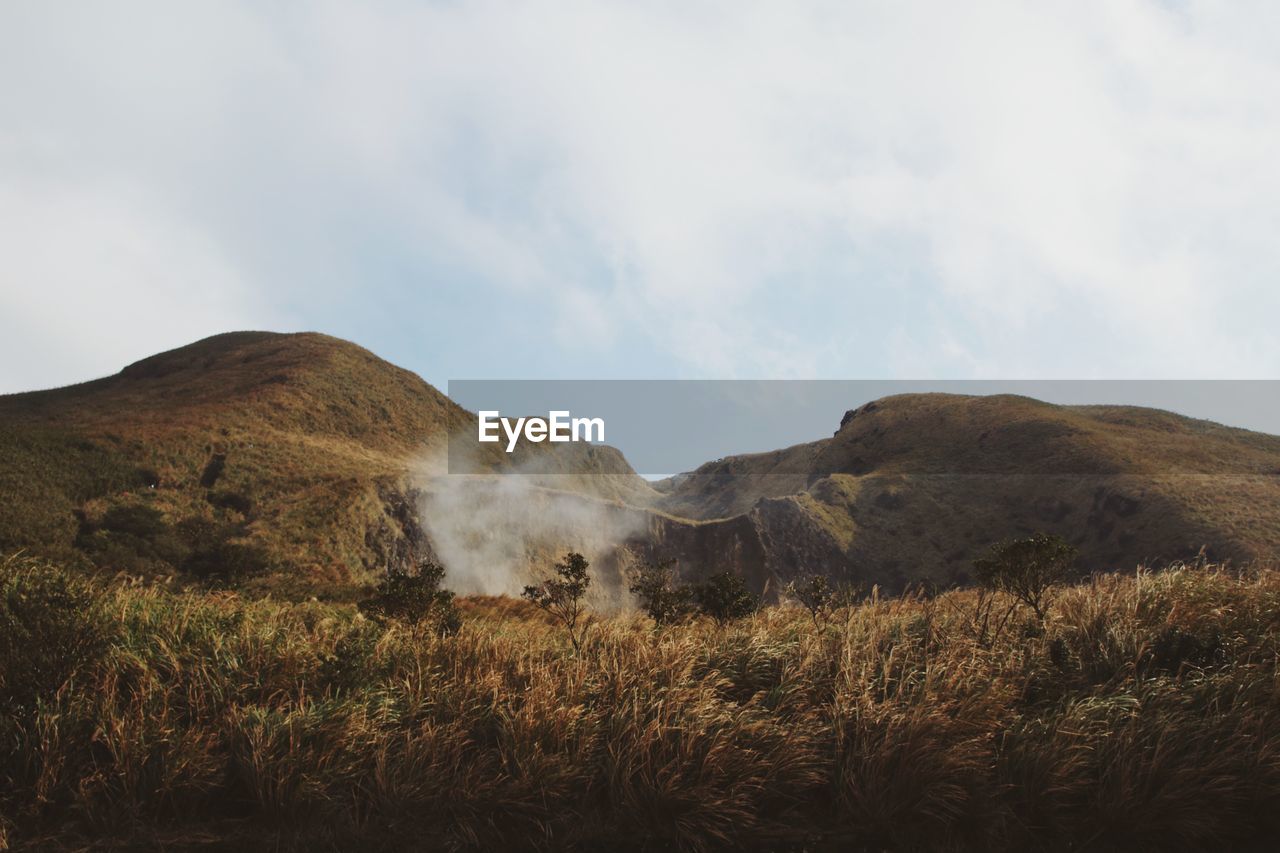 Scenic view of mountains against sky