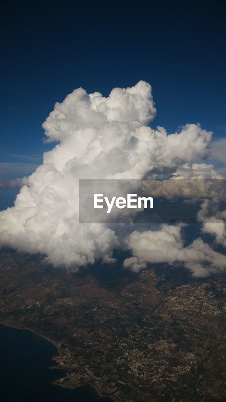 Aerial view of clouds above landscape