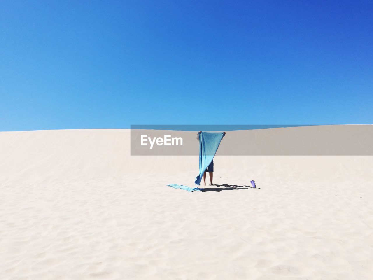 Scenic view of beach against clear sky