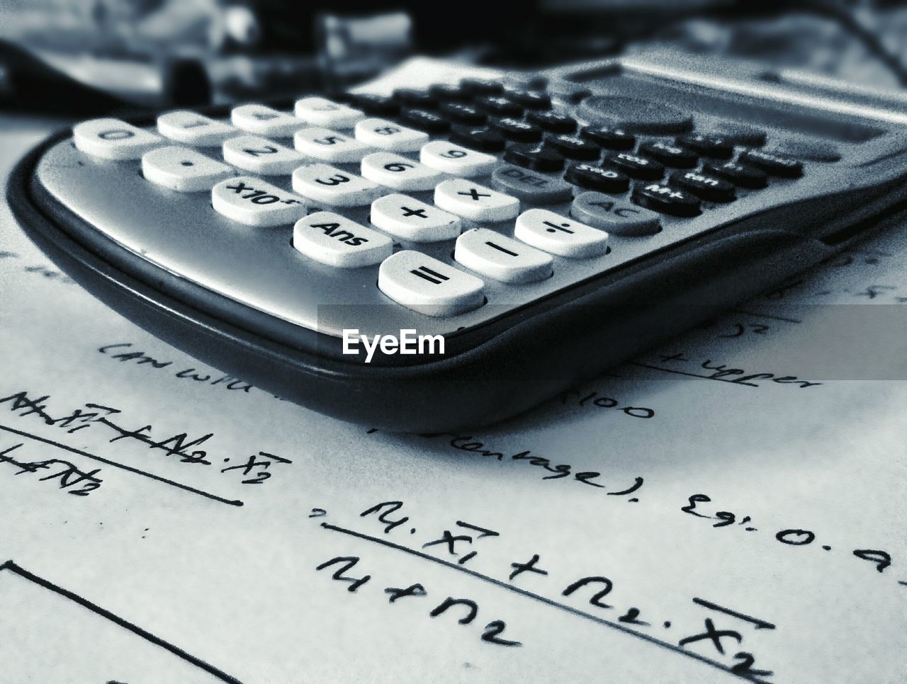 Close-up of calculator and paper