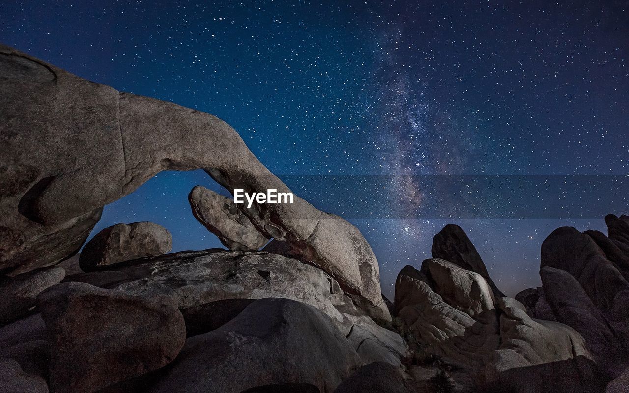 View of rock formations at night