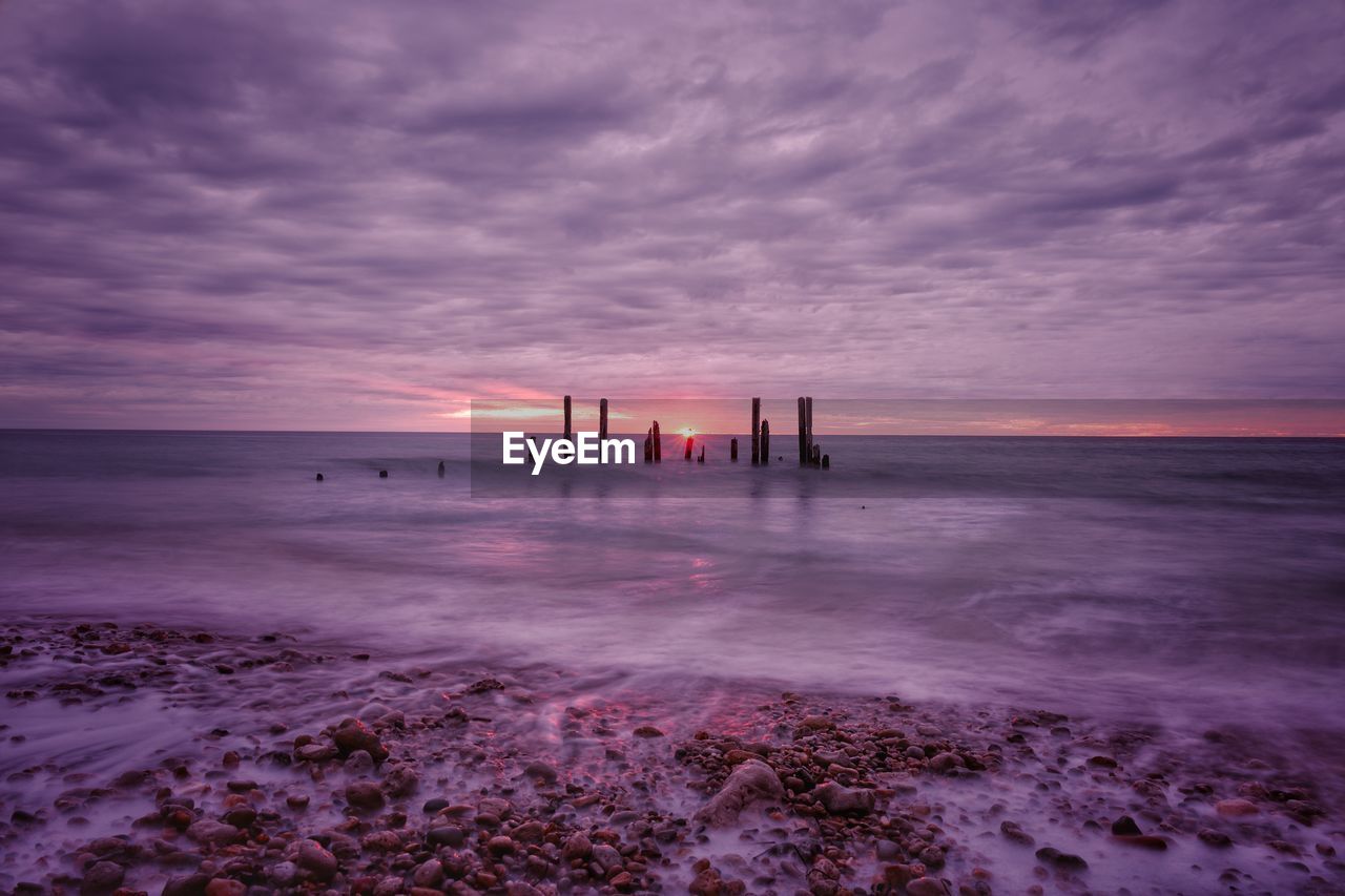 SCENIC VIEW OF SEA DURING SUNSET