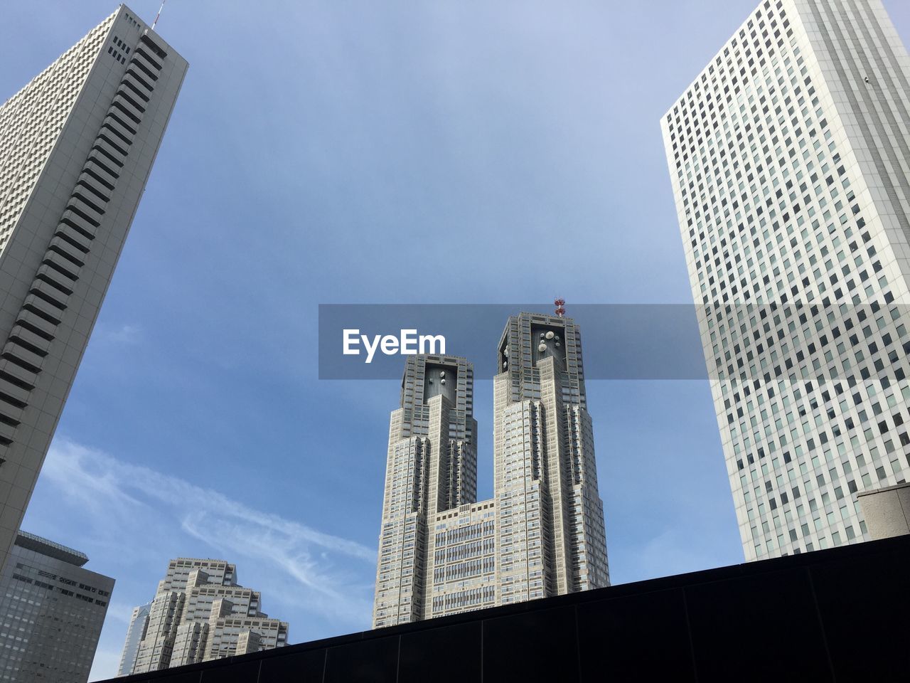 Low angle view of tokyo metropolitan government building against sky