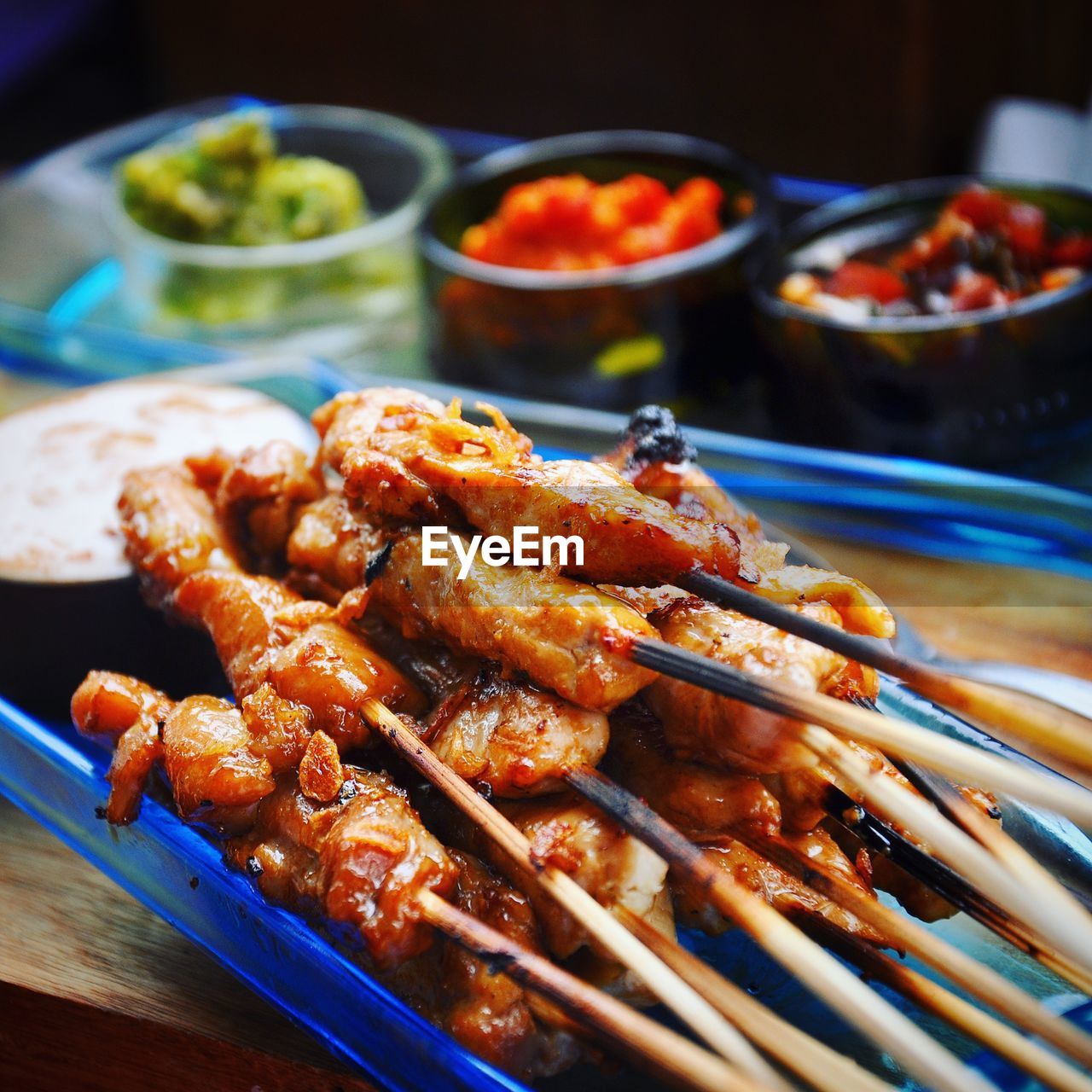 Close-up of food in skewers on plate