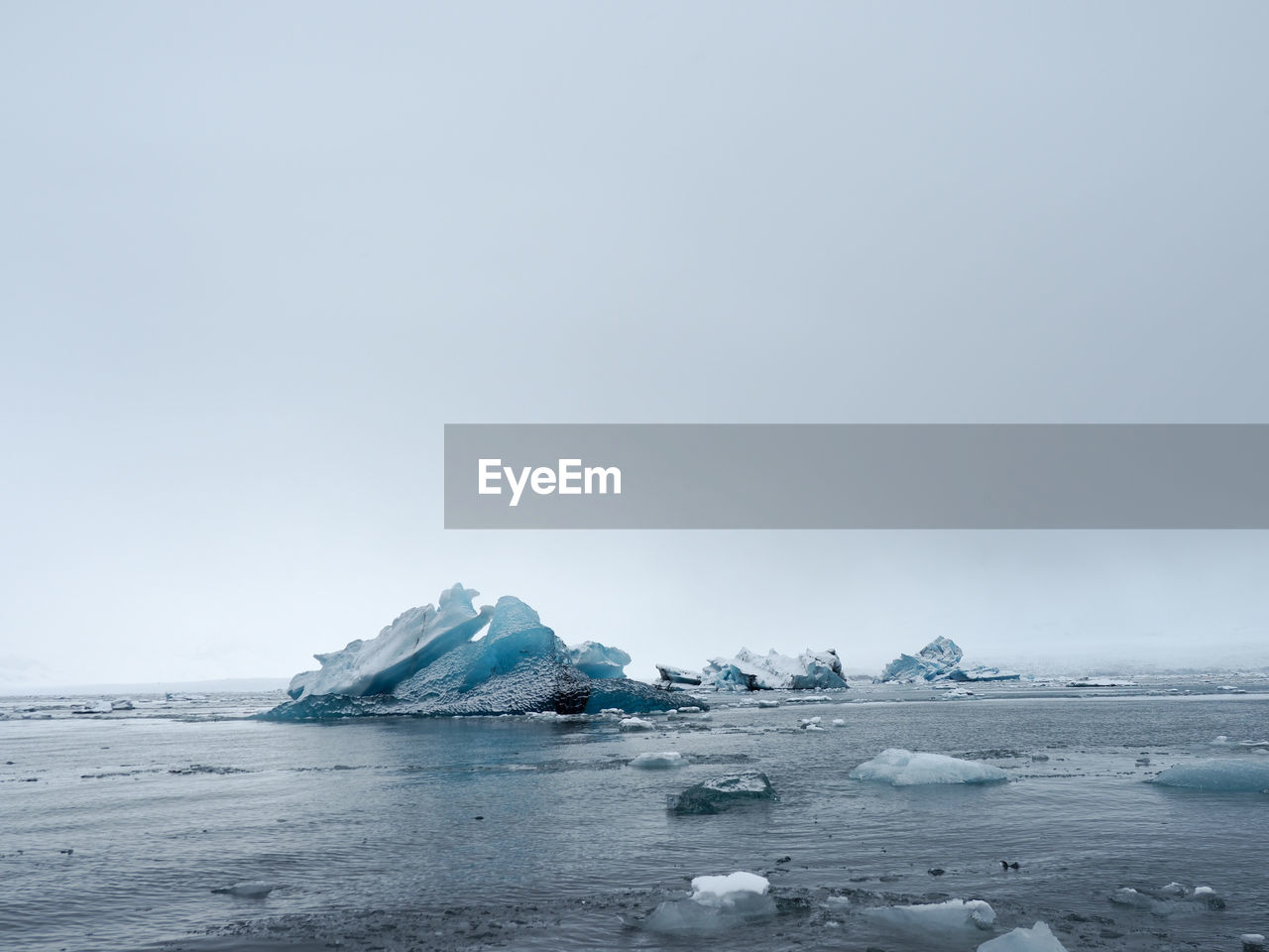 Scenic view of frozen sea against sky