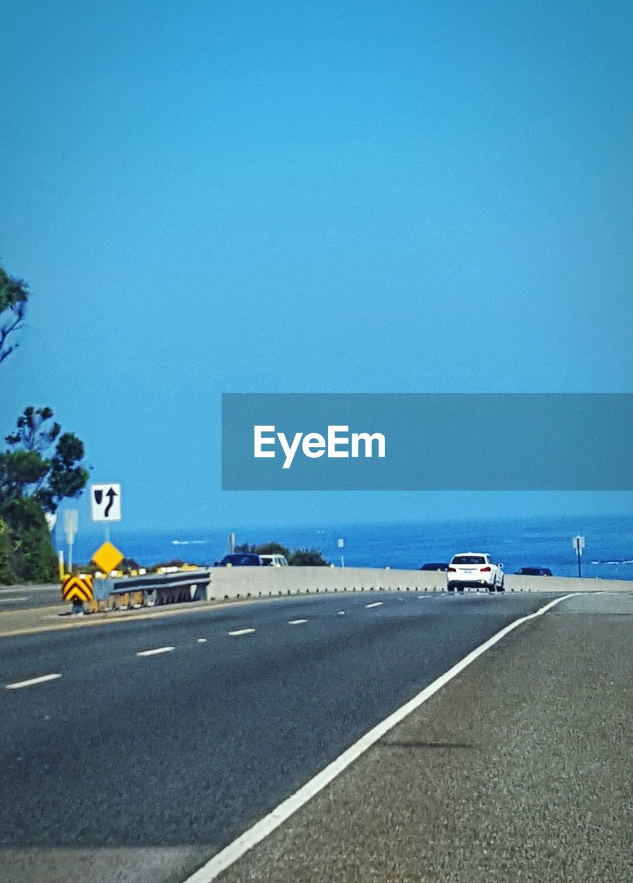 VIEW OF ROAD AGAINST CLEAR SKY