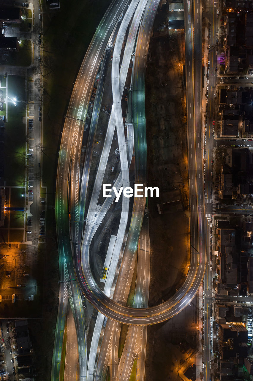 Aerial view of road in city at night