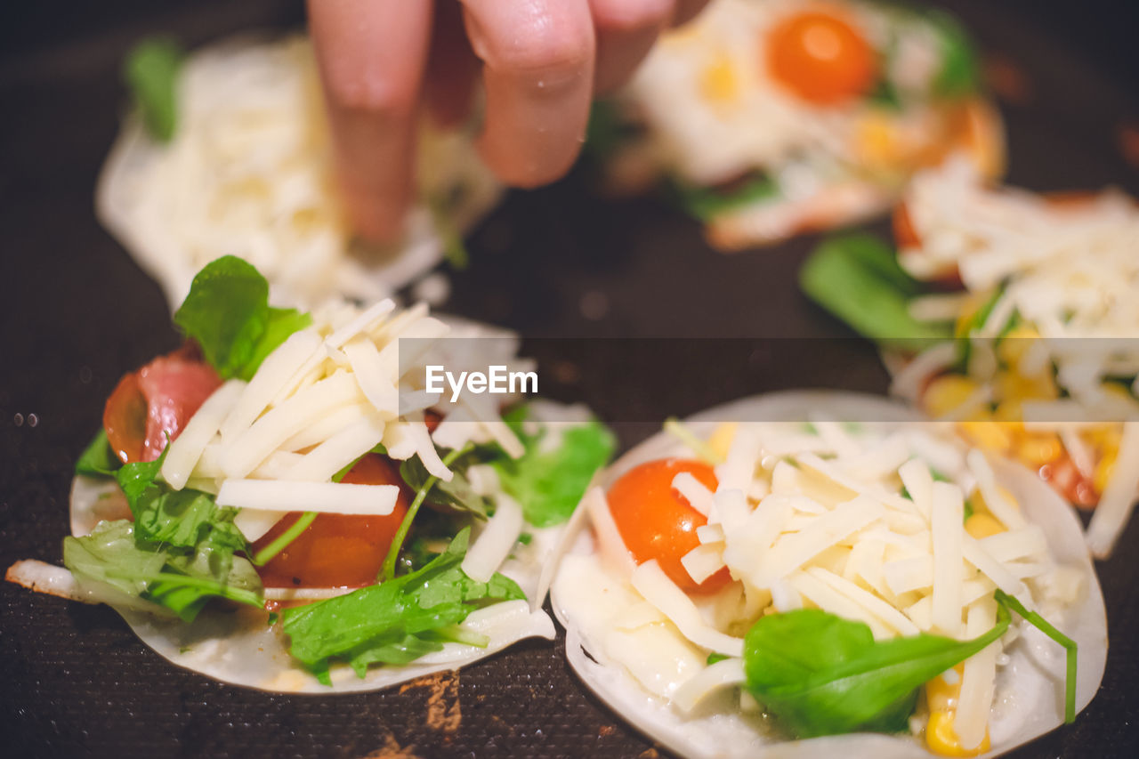 Homemade dumpling skin pizza party on a hot plate japanese family table