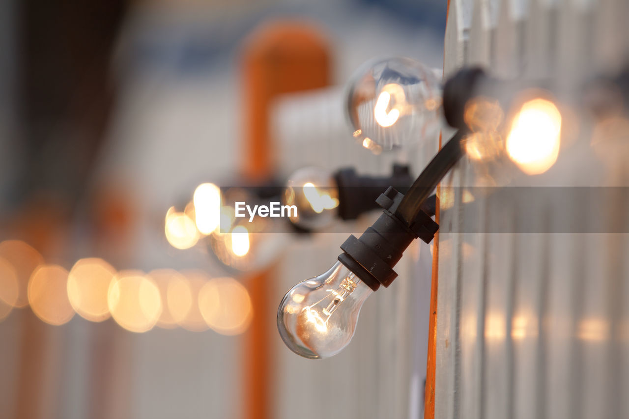 Close-up of illuminated light bulb