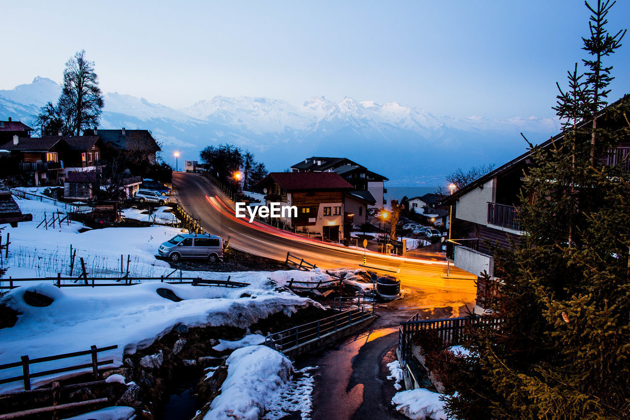 High angle view of snow covered road against sky