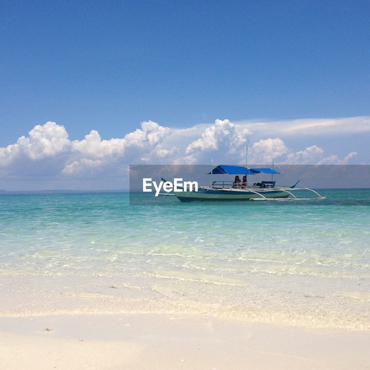 Scenic view of calm sea against sky